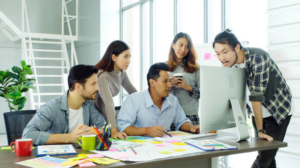 istock Group of creative design meeting brainstorm ideas to plan and develop project at office, Small business startup coworker, colleagues working  for the solution, Coorperate team 1402774387