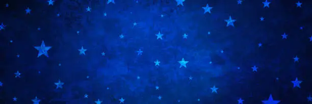 Photo of Star background. 4th of July background pattern. Starry night sky in dark blue with old vintage grunge texture. July 4th, Veterans day, memorial day and other United States of America holiday.