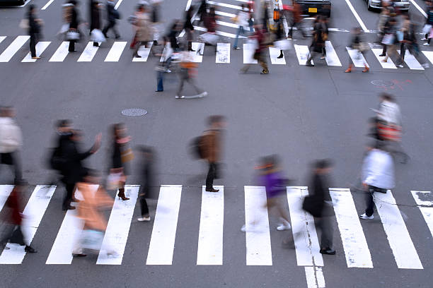 istock People crossing the street 140278372