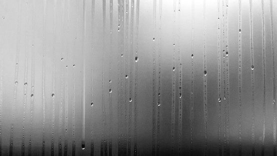 A photo of water from rain on a window