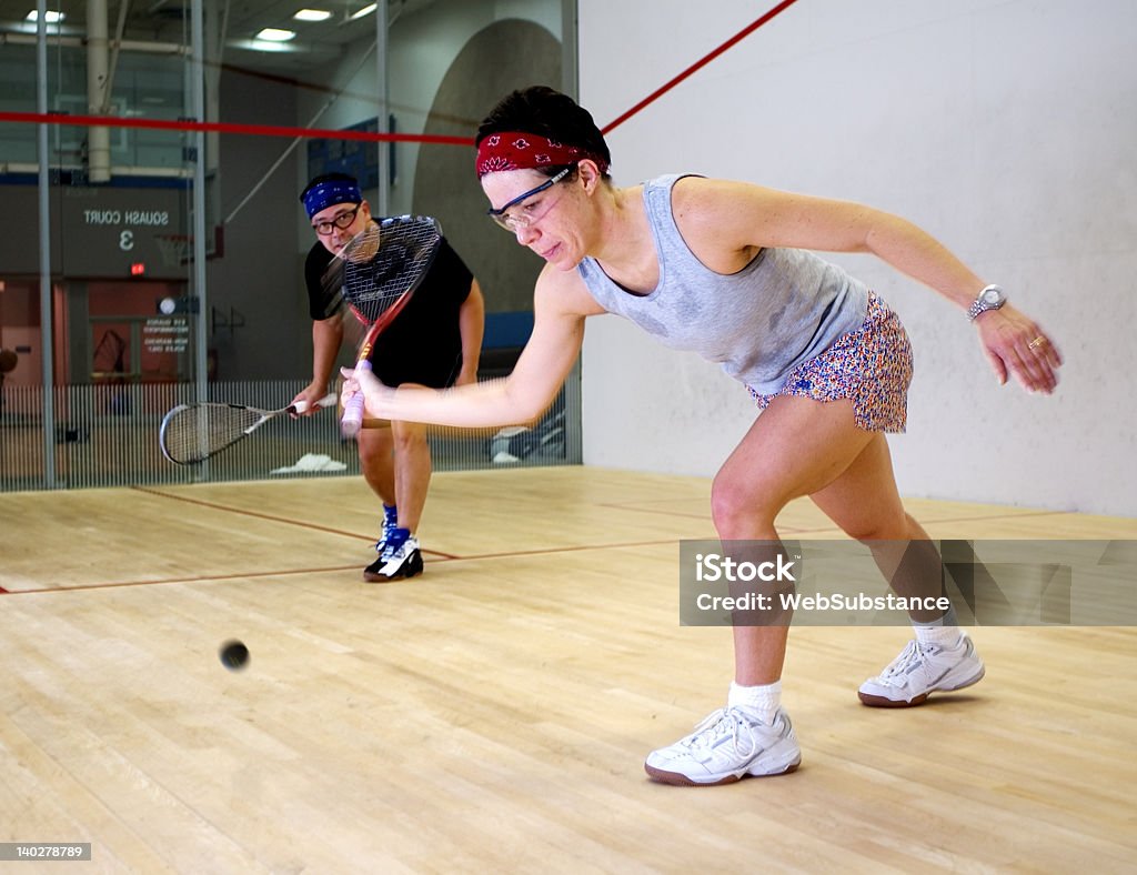 Mulher e homem Jogando Abóbora - Royalty-free Squash Foto de stock