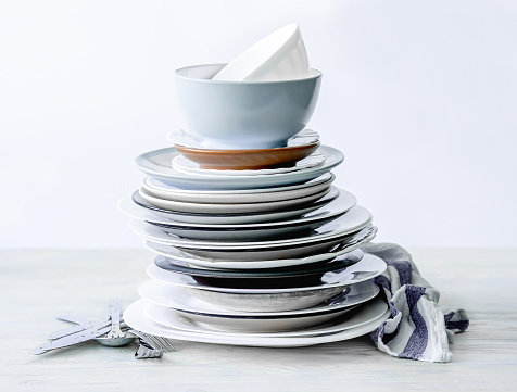 stacks of plates and rows of books for space saving and home decoration