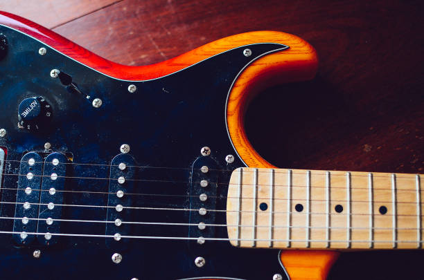 istock colorful electric guitar close up 1402790916