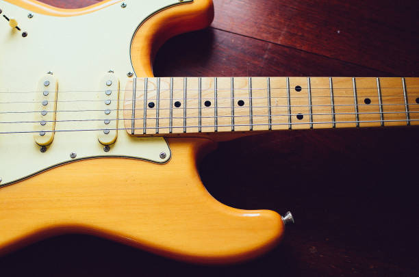 istock colorful electric guitar close up 1402790917