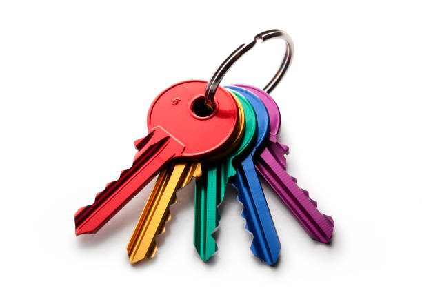 tas de touches de couleur - key house house key green photos et images de collection