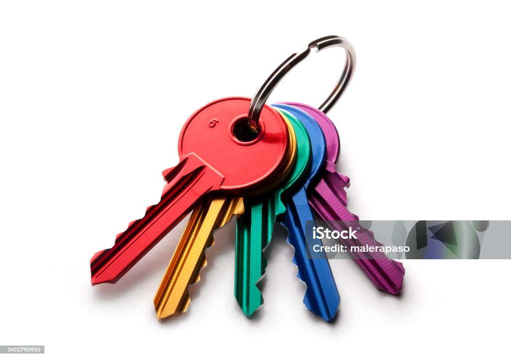 Bunch of colored keys Aluminum keys isolated on white background. Key Stock Photo