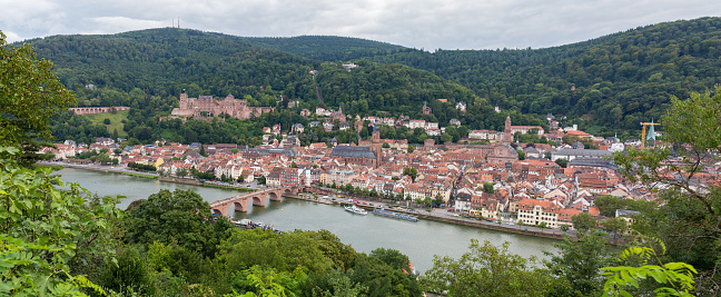Heidelberg, Germany - Aug 26, 2021: High angle panorama view on the city of Heidelberg. With Heidelberg castle and the old bridge.
