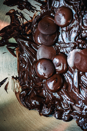 Closeup shot of cooking chocolate in a metal bowl