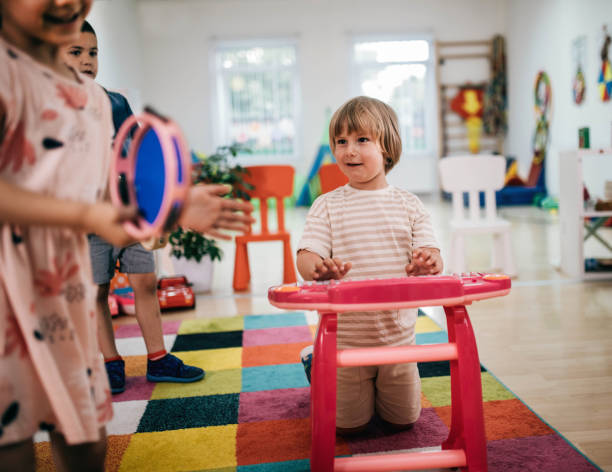 istock preschool age children in music class 1402793541