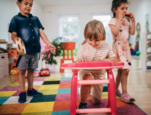 istock preschool age children in music class 1402793542