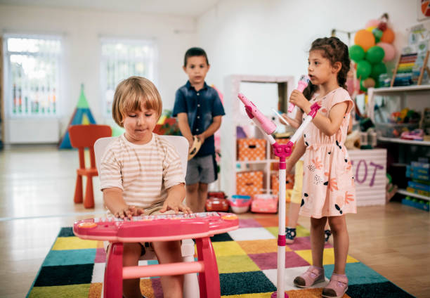 istock preschool age children in music class 1402793548