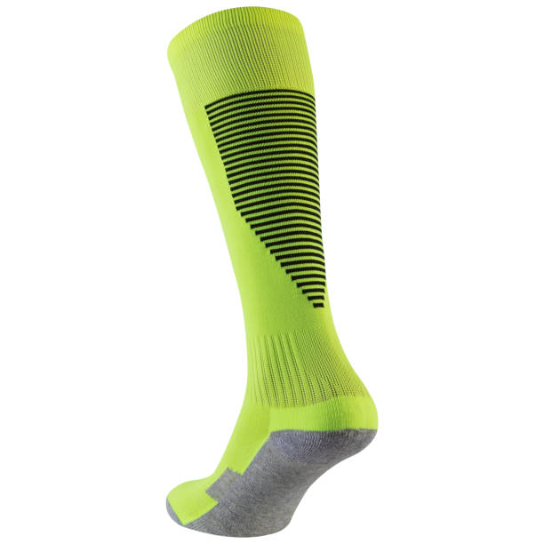 istock High sports light green gaiters or socks, with a compression effect, on a white background 1402793806