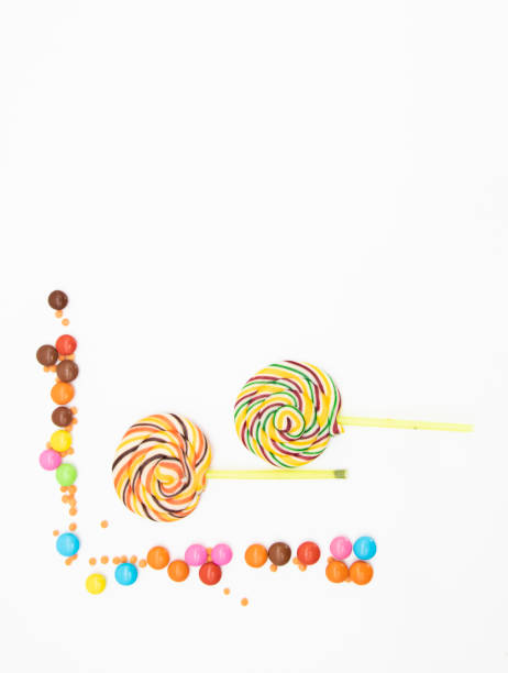 istock round candy and colored lollipops on white backgrounds 1402795925