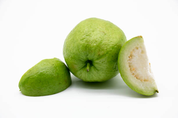Whole and slices Guava isolated on the white background stock photo