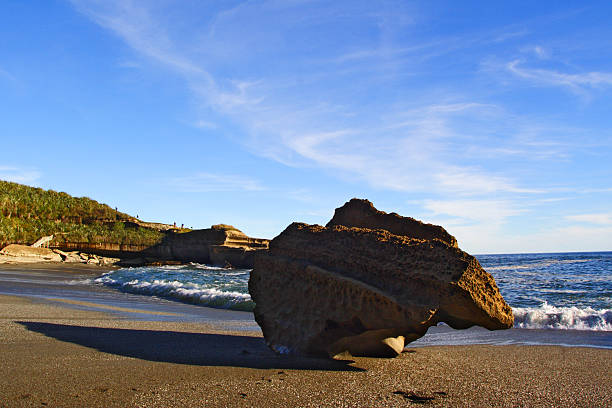 Eroded Rock on Beach stock photo