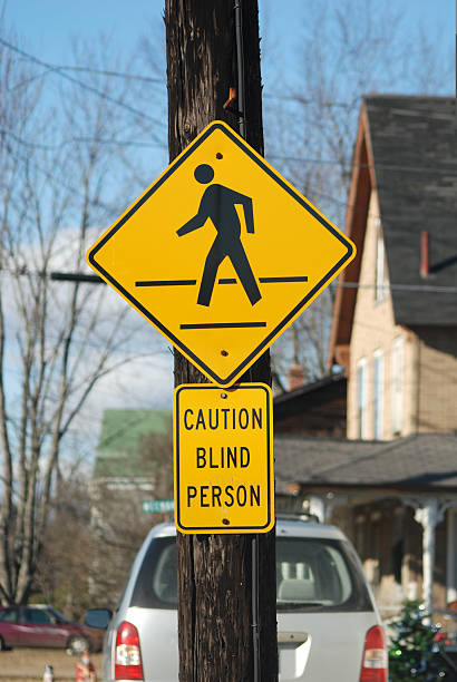 caution blind person stock photo