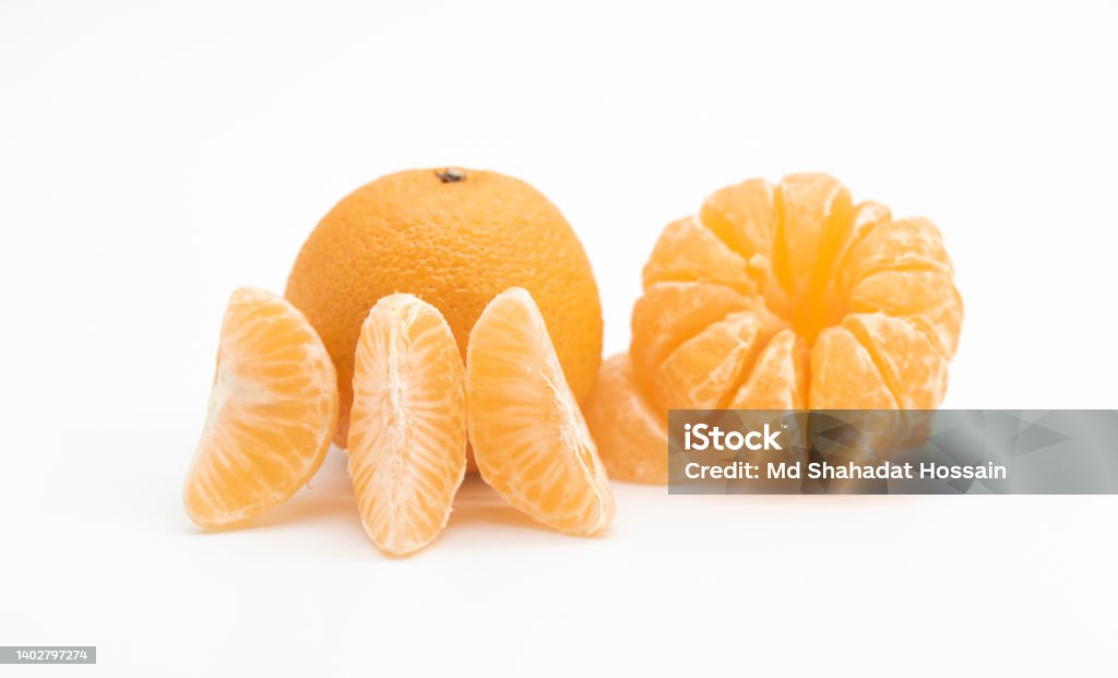 Tangerine or kamala with pieces over on white background Bangladesh Stock Photo