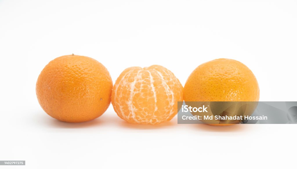 whole and slice Tangerine or kamala over on white background, Bangladesh Stock Photo