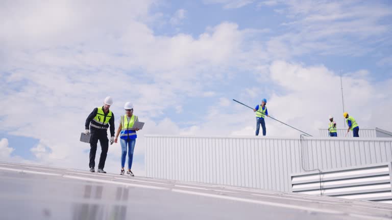 Solar panel maintenance team.