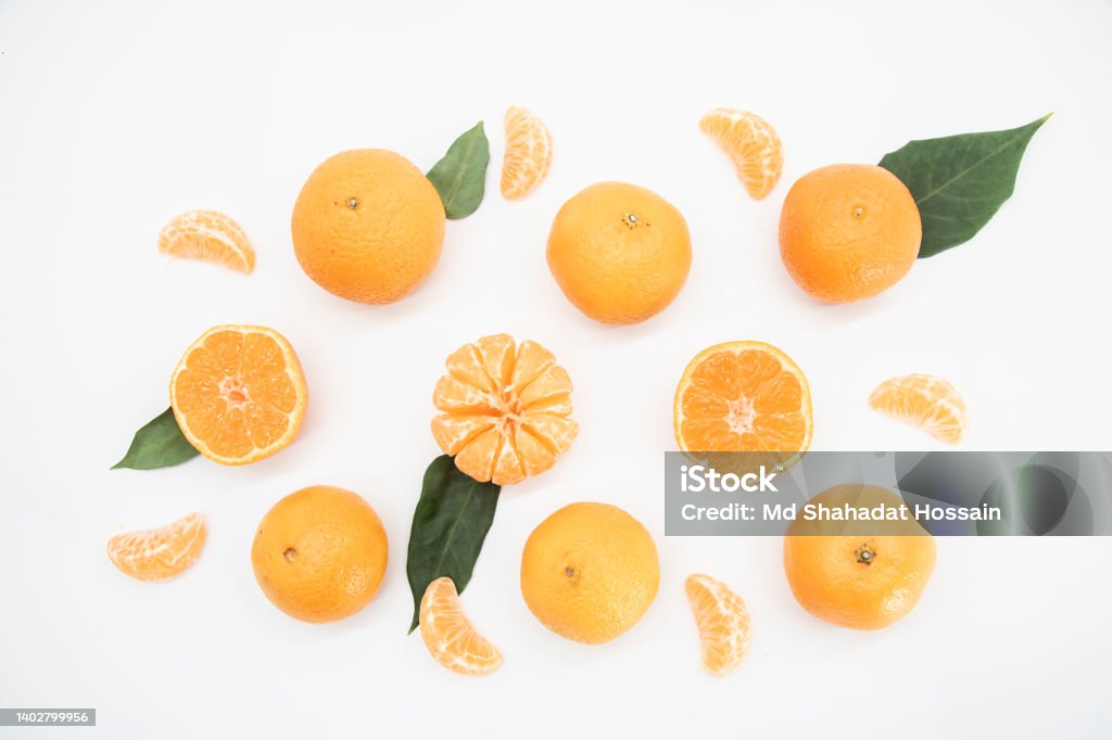 Tangerine or kamala with leaf isolated on white background,top view Slice of Food Stock Photo