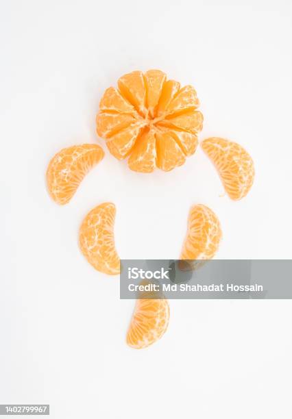 Slice Tangerine Or Orange With Leaf Design Isolated On White Backgroundtop View Stock Photo - Download Image Now