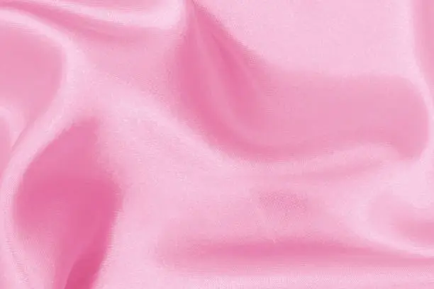 Photo of Pink fabric cloth texture for background and design art work, beautiful crumpled pattern of silk or linen.