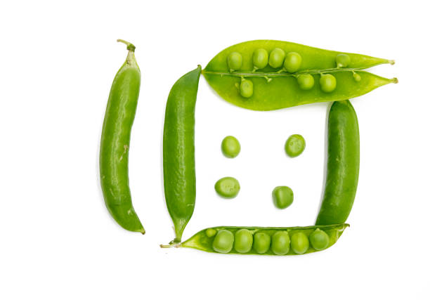 istock Pea or peas vegetable isolated on white background.Top view 1402802588