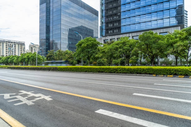 istock empty urban road with modern building in the city 1402803243