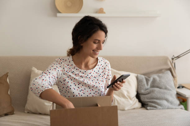 istock Happy consumer giving feedback to online order delivery 1402803772