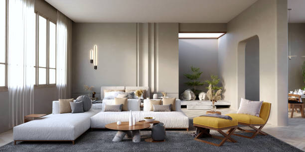 istock 3d rendering,3d illustration, Interior Scene and  Mockup,Modern-style living room, white L-shaped sofa, yellow armchair, marble leg center table, wooden top. 1402804502