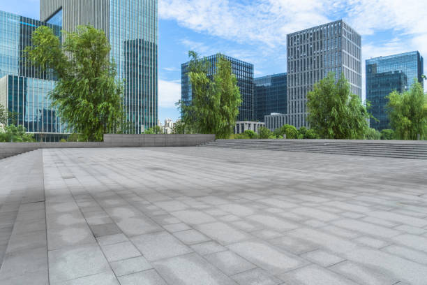 istock empty pavement and modern buildings in city 1402805687