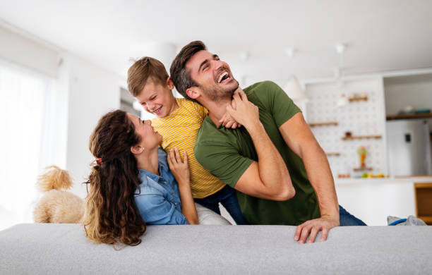 istock Happy family having fun time at home 1402806501