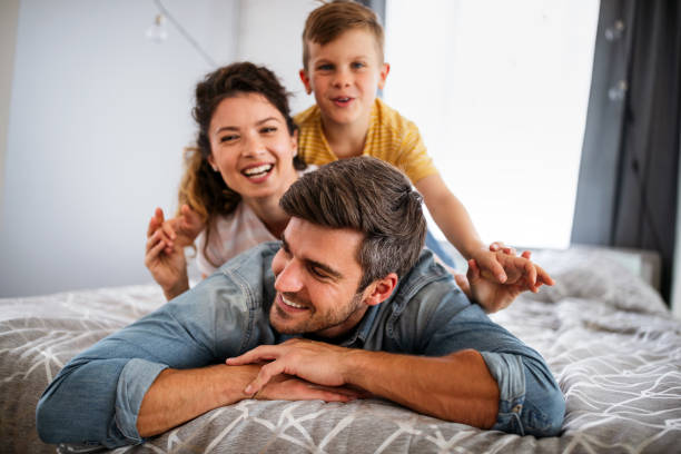 istock Happy family spending time together, having fun at home 1402806527