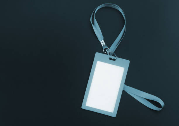 istock Black badge with ribbon on black background 1402808402