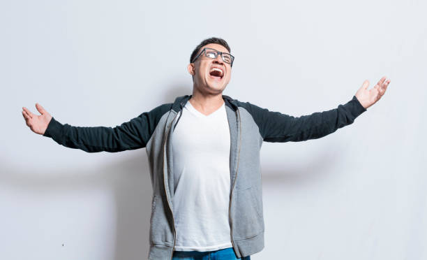 istock Angry people shouting up with open arms, Man with open arms shouting angry up, Desperate and angry person shouting with open arms 1402808681
