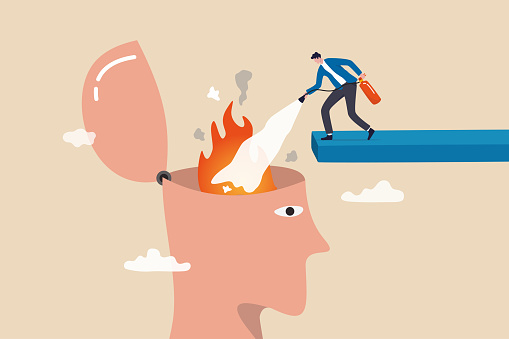 Therapy to cool down burning mind or anger, reduce burnout or mental illness, depression, cure anxiety and stress concept, man with fire extinguisher try to extinguish burning fire on human head.