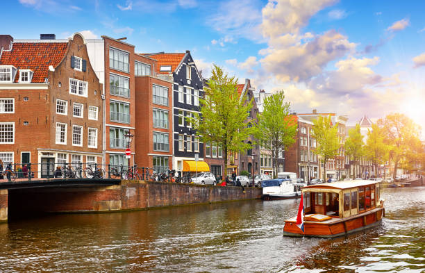 istock Channel in Amsterdam Netherlands houses river Amstel 1402816136