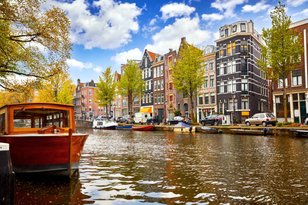 istock Channel in Amsterdam Netherlands houses river Amstel 1402816270