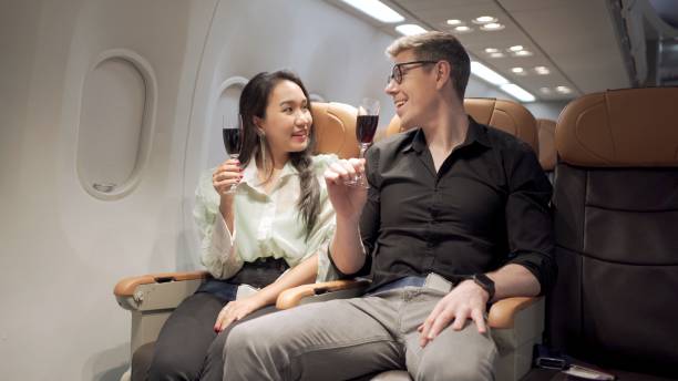 istock Couple traveling by airplane 1402819539