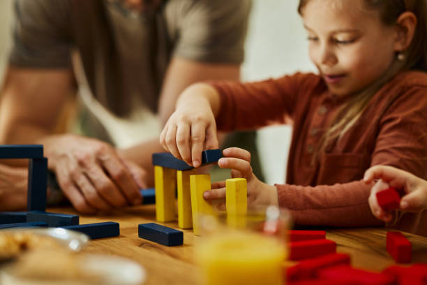 istock Playing with wooden blocks at home! 1402822166