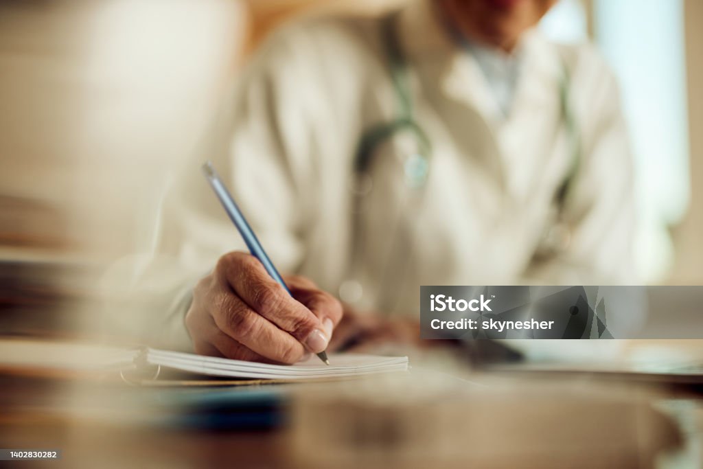Doctor Note Taking Key Taking Notes At Doctors Office Stock Photo - Download Image Now ...