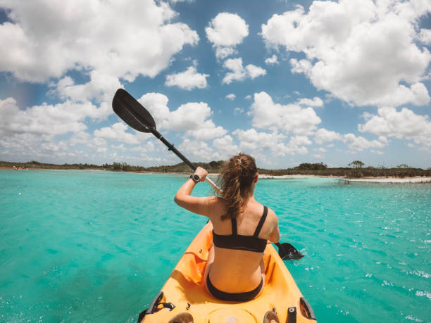 istock Woman kayaking on Bacalar lake 1402830596