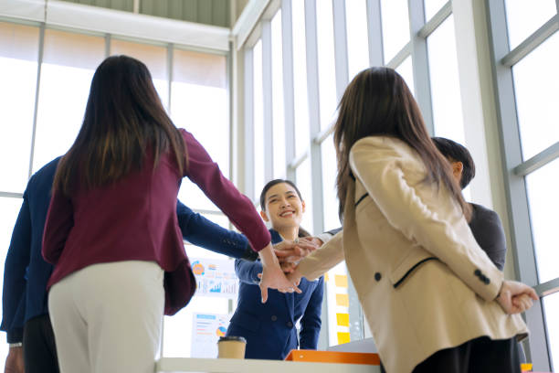 istock White collar workers are meeting on the table. 1402832440