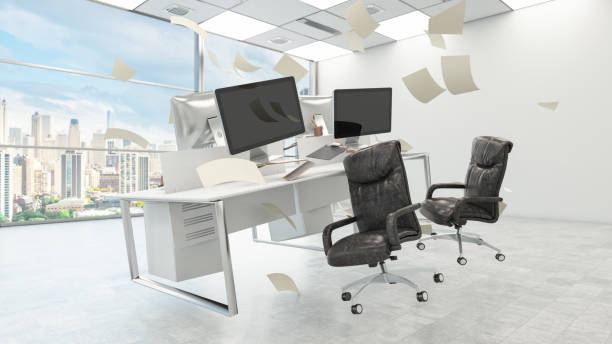 Computer Monitor, Keyboard And Office Tools Are Flying In The Air With Zero Gravity Concept In The Workspace stock photo