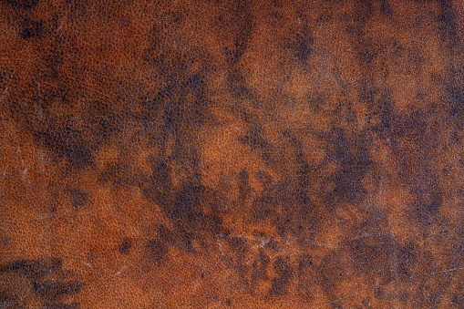 Dark brown mottled pattern leather texture background, high resolution