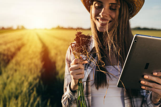 istock woman farmer outdoor 1402841804
