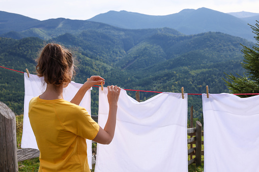 Drying sweaty mountain shirts on the wire in mountain, Kamnik - Savinja Alps, Slovenia