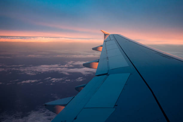 istock View from an airplane of a sunrise from the sky 1402847036