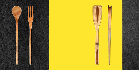 Topview of Set Cooking Wooden Utensils on Colored Background