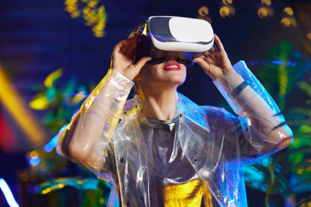 istock stylish woman in virtual reality in vr headset 1402853130